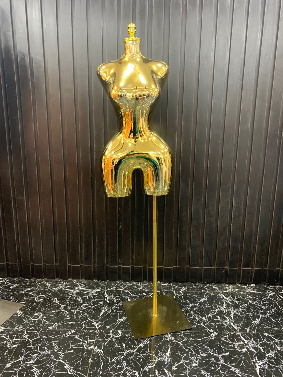 Golden dress form