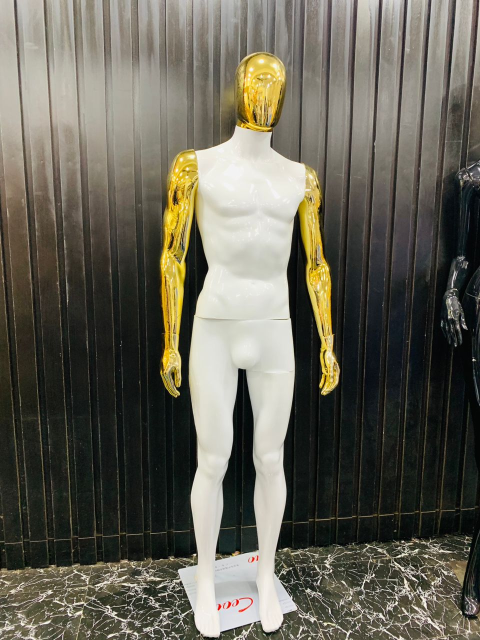 golden arm mannequin